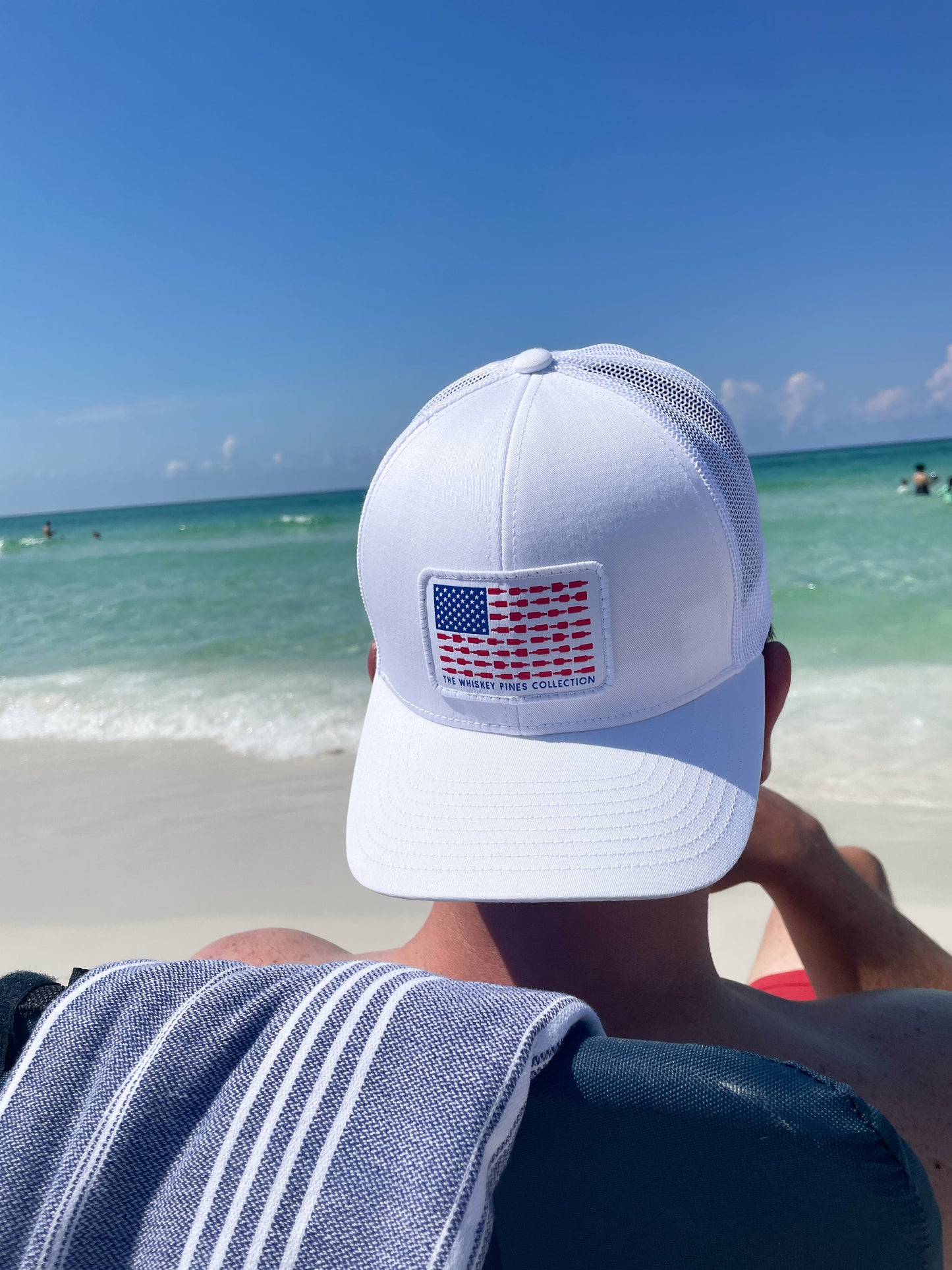 Whiskey American Flag Trucker Hat by The Whiskey Pines Collection