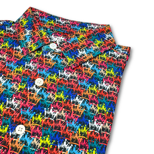 Colorful patterned shirt with buttons on a white background