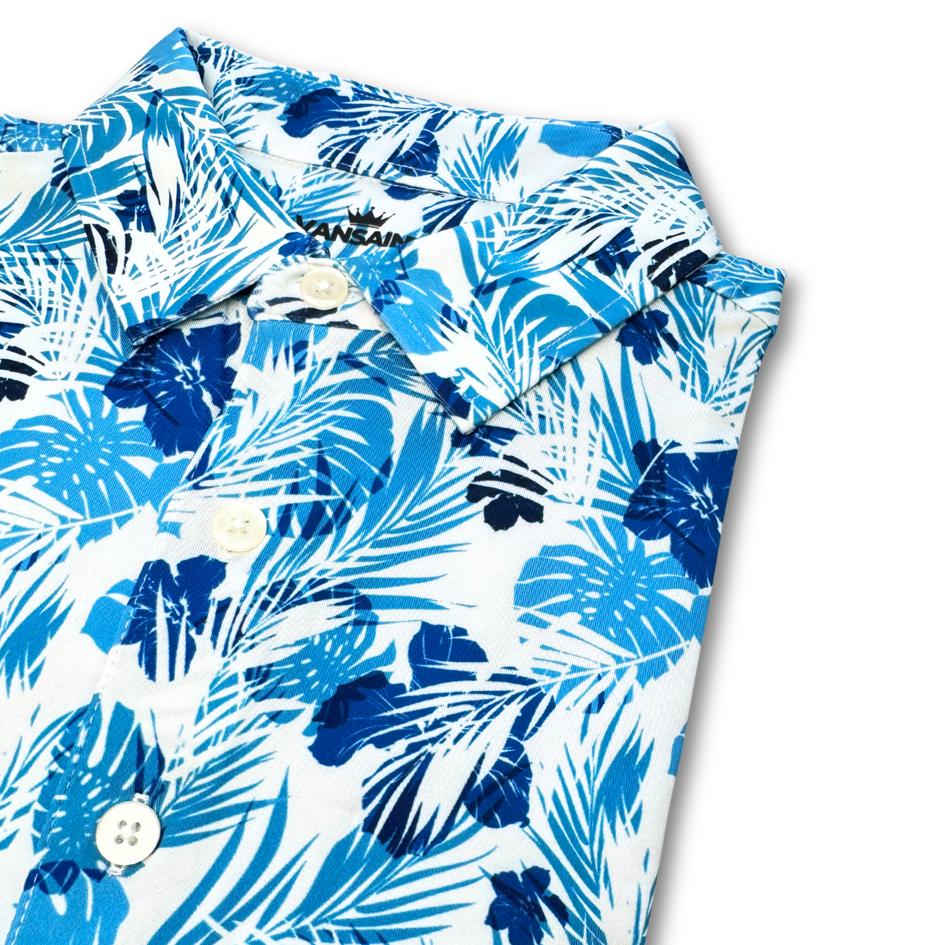 Blue and white floral patterned shirt on a white background