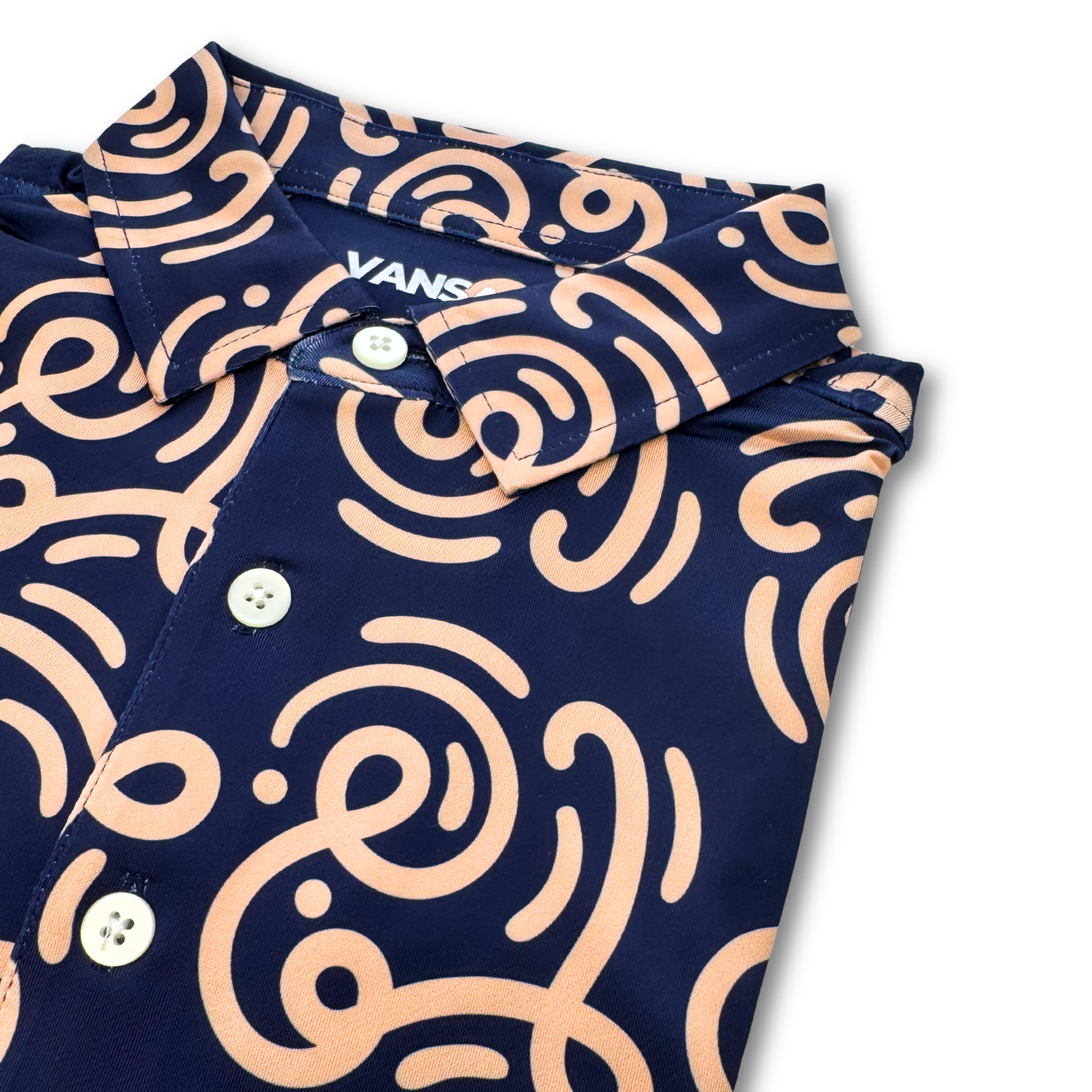 Navy shirt with beige abstract pattern on a white background