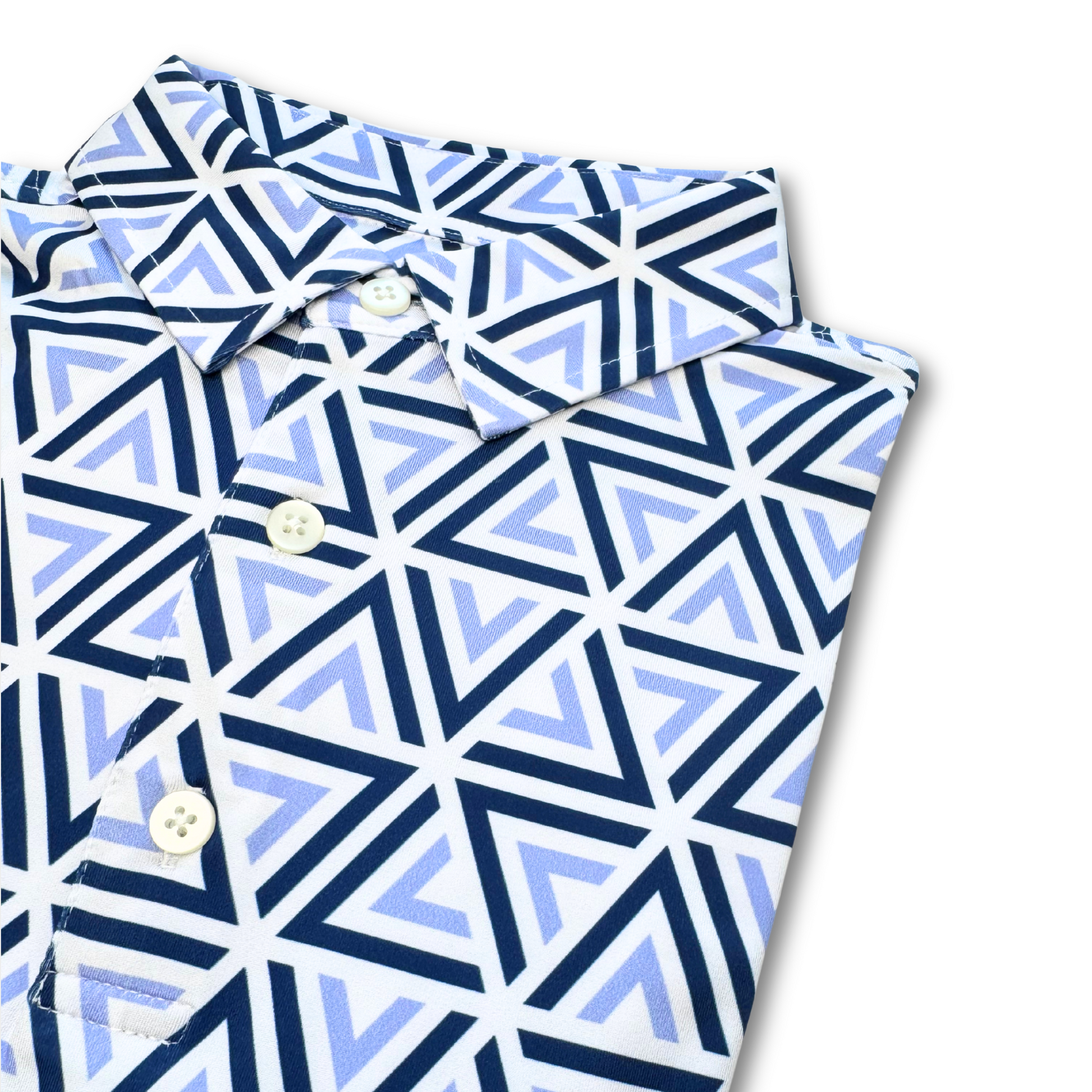 Folded polo shirt with blue and white geometric pattern on a white background