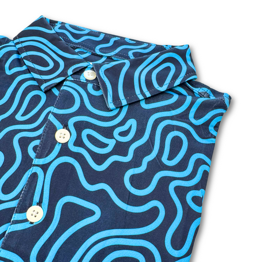 Navy shirt with blue wavy pattern on a white background