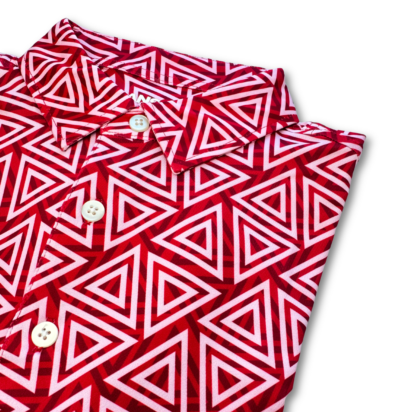 Red and white geometric patterned polo shirt with buttons on a white background