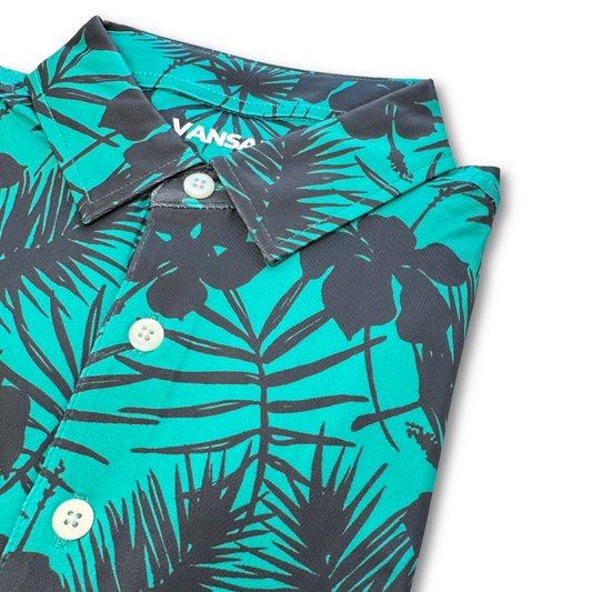 Tropical green shirt with black leaf pattern on a white background